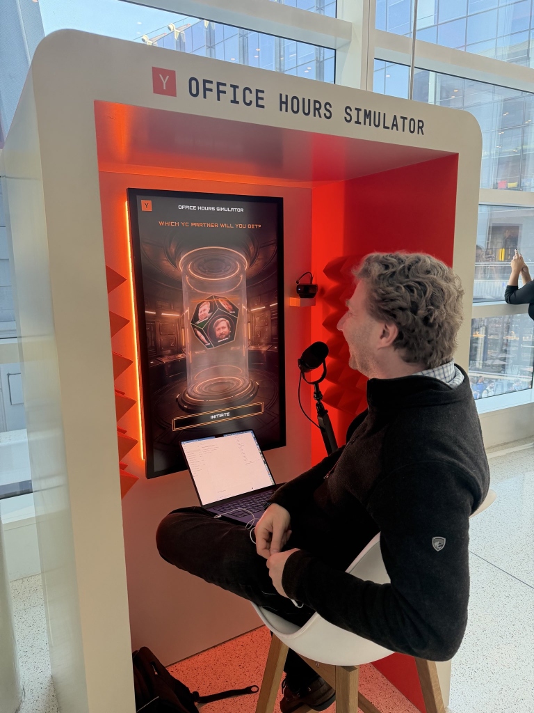 Brad Flora in YC Office Hours Simulator booth